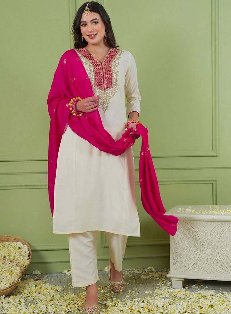 Off white color rich girlie looks silk fabric embroidered readymade partywear suit for girl