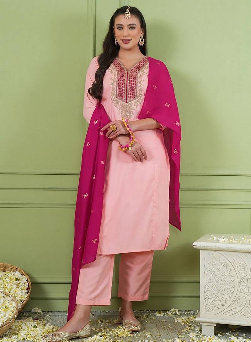 Peach color rich girlie looks silk fabric embroidered readymade partywear suit for girl