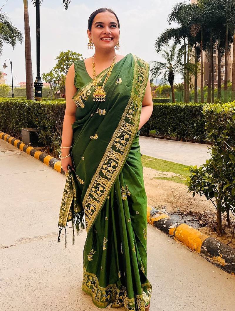 Dark green silk blend woven zari work saree with blouse