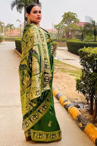 Dark green silk blend woven zari work saree with blouse