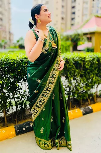 Dark green silk blend woven zari work saree with blouse