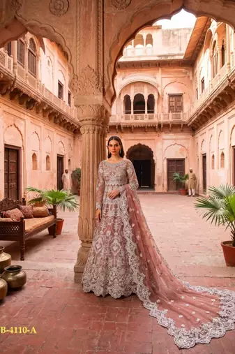 Peach net anarkali suit with embroidered diamond 