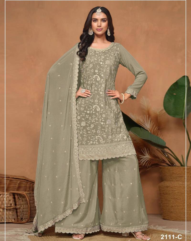 Green vichitra silk semi stitched suit with embroidery & sequence work