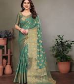 Green blended cotton woven zari work saree with blouse