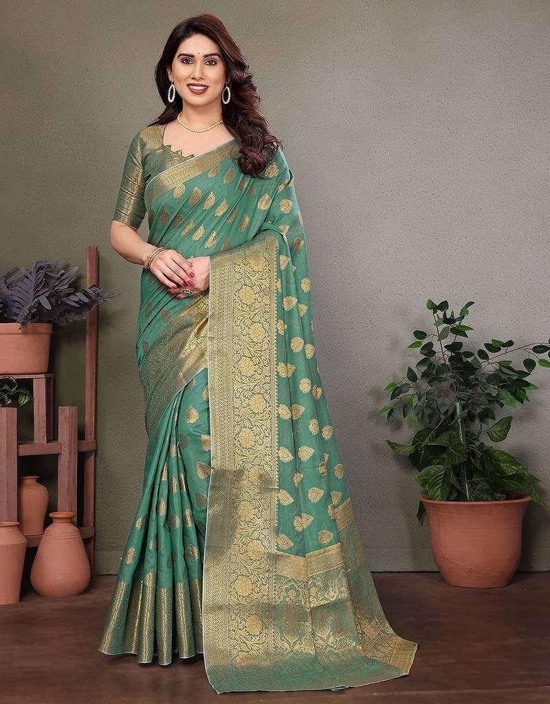 Green blended cotton woven zari work saree with blouse