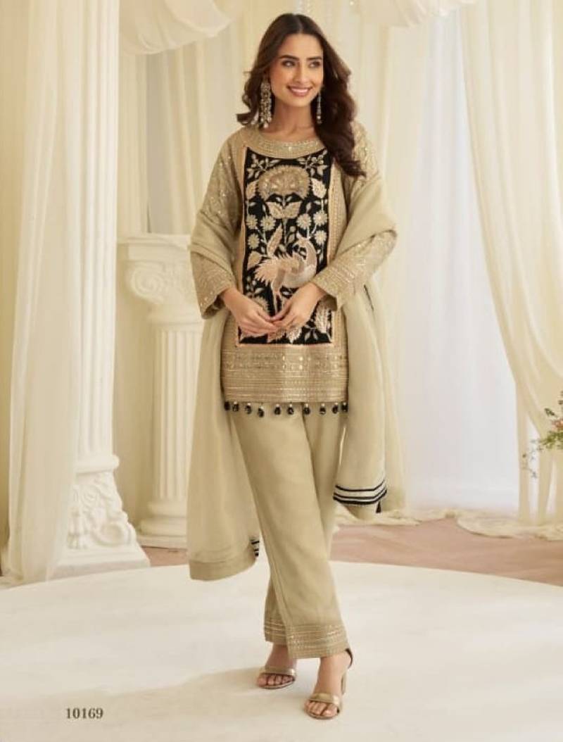 Cream crepe silk free size stitched suit with embroidery & mirror work