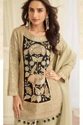Cream crepe silk free size stitched suit with embroidered mirror 