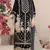 Black fox georgette suit with embroidered khatli 