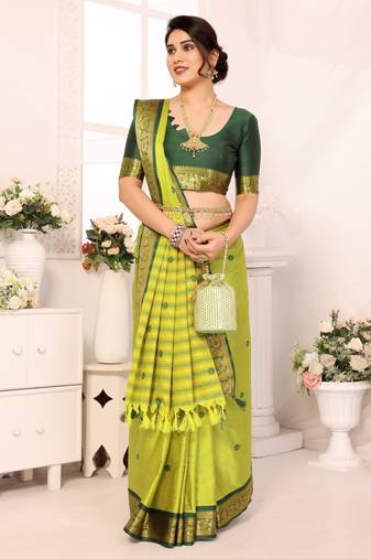 Light green blended cotton woven zari work saree with blouse