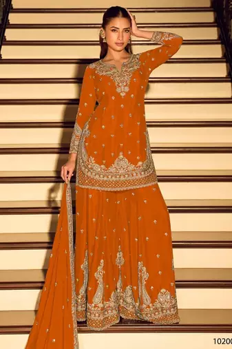 Orange chinon free size stitched suit with embroidery beats work