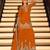 Orange chinon free size stitched suit with embroidery beats work
