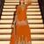 Orange chinon free size stitched suit with embroidery beats work