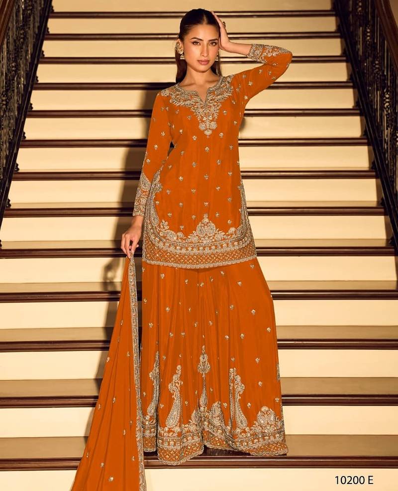 Orange chinon free size stitched suit with embroidery beats work
