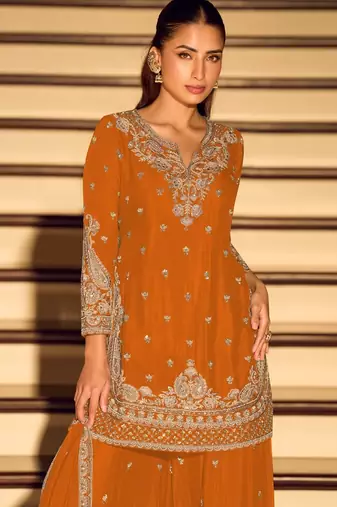 Orange chinon free size stitched suit with embroidery beats 