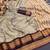 Beige blended cotton embroidered zari work saree with blouse