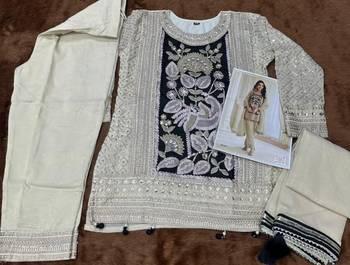 Cream crepe silk free size stitched suit with embroidered mirror  4