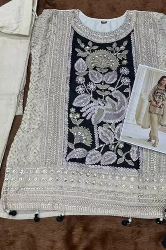 Cream crepe silk free size stitched suit with embroidered mirror 