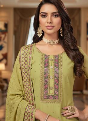 Green color smat and designer embrodiered sharara dress for ceremonial looks 3