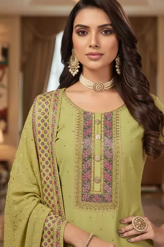 Green color smat and designer embrodiered sharara dress for ceremonial looks