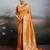 Orange color silk blend fabric woven designer heavy ceremonial saree
