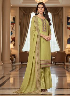 Green color smat and designer embrodiered sharara dress for ceremonial looks 4