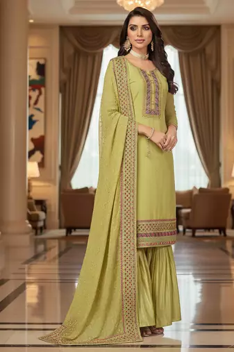 Green color smat and designer embrodiered sharara dress for ceremonial looks