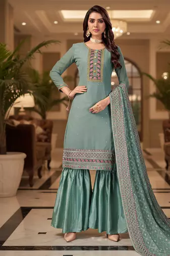Peach color smat and designer embrodiered sharara dress for ceremonial looks