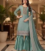Peach color smat and designer embrodiered sharara dress for ceremonial looks