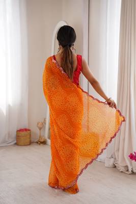 Orange georgette bandhej print traditional saree 2