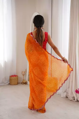 Orange georgette bandhej print traditional saree