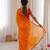 Orange color georgette fabric bandhej print traditional saree