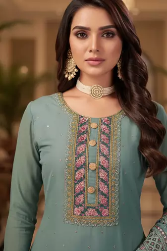 Peach color smat and designer embrodiered sharara dress for ceremonial looks