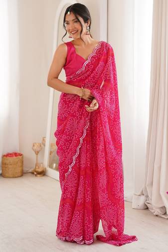 Pink color georgette fabric bandhej print traditional saree