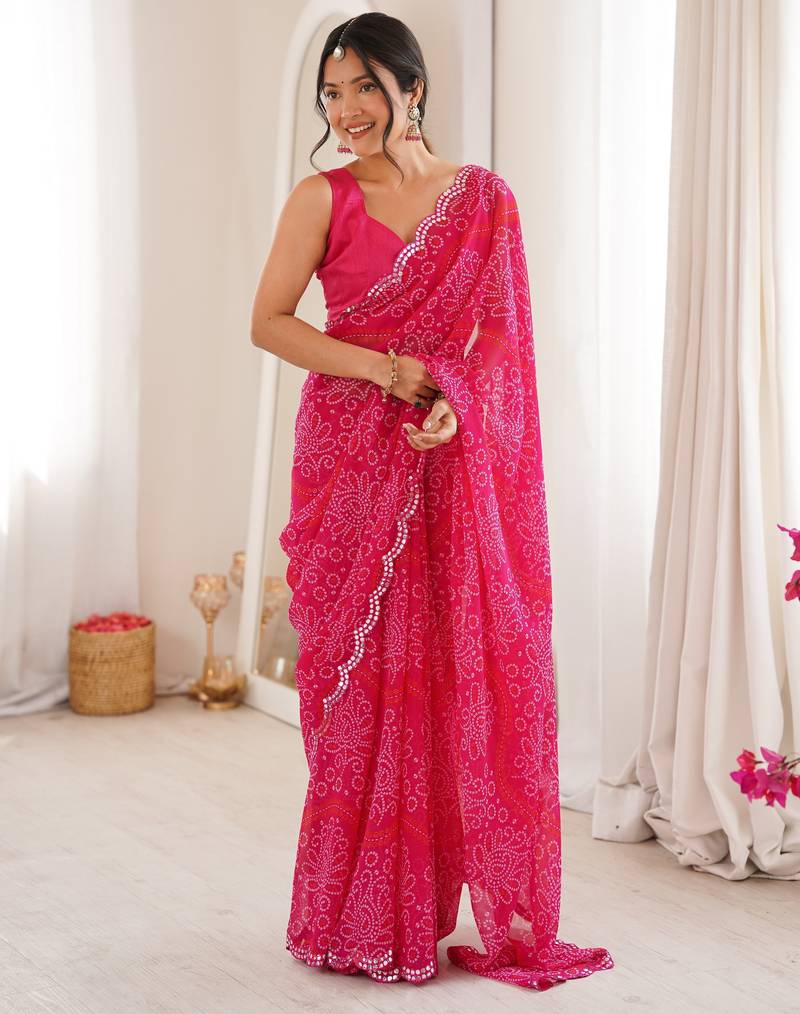 Pink color georgette fabric bandhej print traditional saree