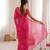 Pink color georgette fabric bandhej print traditional saree