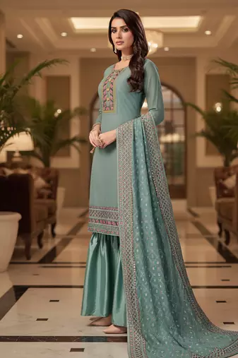 Peach color smat and designer embrodiered sharara dress for ceremonial looks