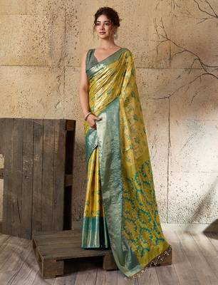 Yellow soft silk blend woven zari work ethnic partywear saree 1