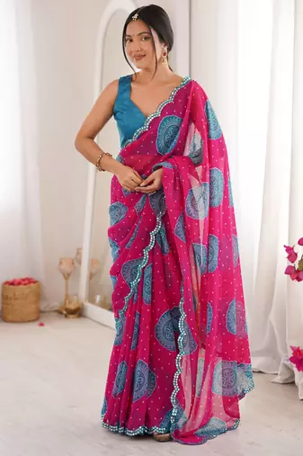 Pink color faux georgette bandhani printed traditional festive saree