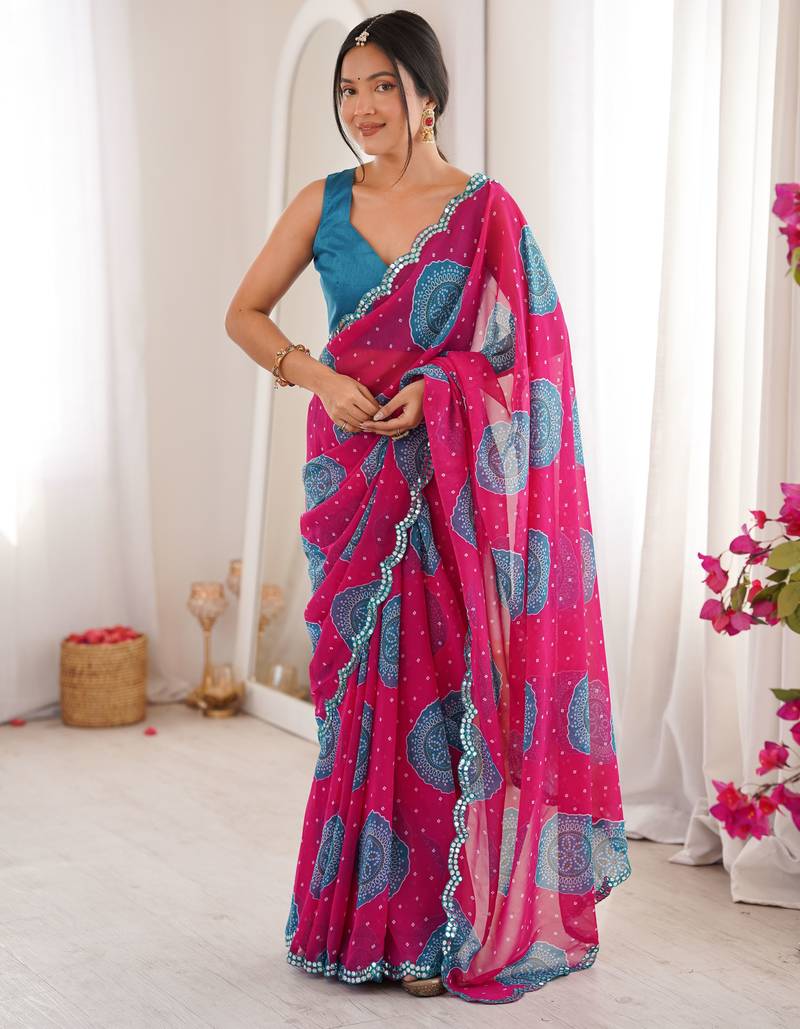 Pink color faux georgette bandhani printed traditional festive saree
