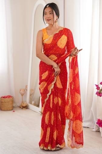 Red color faux georgette bandhani printed traditional festive saree