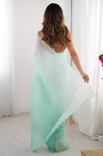Green padding s arco border fancy girlie saree