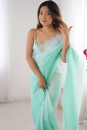Green padding s arco border fancy girlie saree