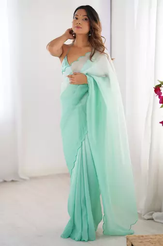 Green padding s arco border fancy girlie saree