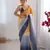 Orange-grey designer padding s arco border fancy girlie saree