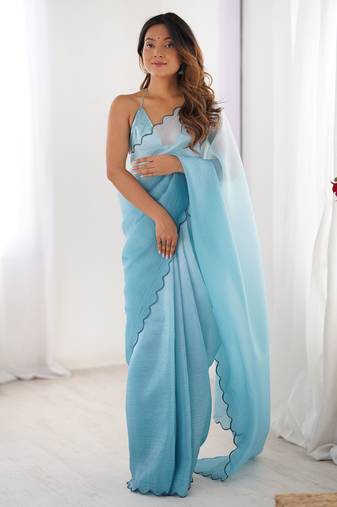 Sky blue color designer padding colors arco border fancy girlie saree