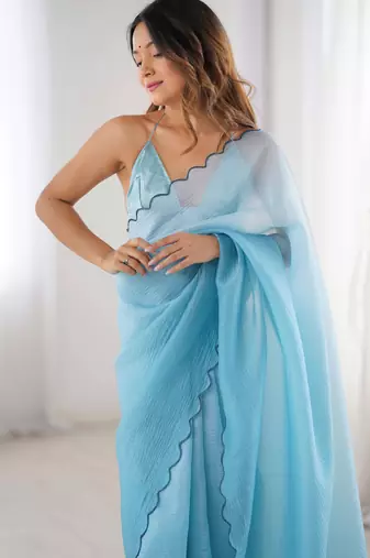 Sky blue padding s arco border fancy girlie saree
