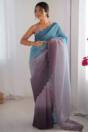Skyblue-grey designer padding s arco border fancy girlie saree