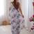 White color chinon fabric designer printed elegant saree with swarovski work