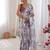 White color chinon fabric designer printed elegant saree with swarovski work