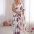 White color chinon fabric designer printed elegant saree with swarovski work